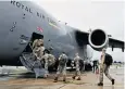  ??  ?? Soldiers board an aircraft ready to fly them to the Caribbean to help in the wake of Irma