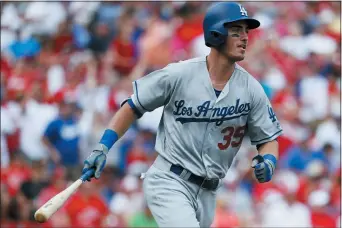  ?? JOHN MINCHILLO — THE ASSOCIATED PRESS FILE ?? If Dodgers star Cody Bellinger hits .400in shortened 50-game season, is it legitimate?