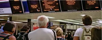  ??  ?? No way out: Passengers left stranded by the railway timetable fiasco in May