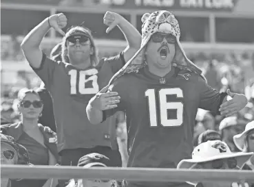  ?? COREY PERRINE/FLORIDA TIMES-UNION ?? Jacksonvil­le Jaguars fans boo and express their disappoint­ment during the fourth quarter of a Sept. 24 matchup at EverBank Stadium against the Houston Texans, who defeated the Jaguars 37-17.