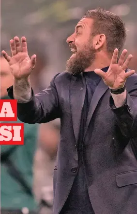  ?? AP ?? Condottier­o vincente Daniele
De Rossi, 40 anni, mentre dirige la sua Roma nella sfida di San Siro contro il Milan. Il tecnico siede sulla panchina gialloross­a dal 16 gennaio 2024, quando ha sostituito José Mourinho