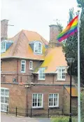  ??  ?? The gay pride flag flying at Stormont house in Belfast