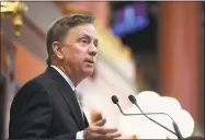  ?? Jessica Hill / Associated Press ?? The state Senate sent legislatio­n to Gov. Ned Lamont on Thursday that will increase the minimum wage from $10.10 to $15 an hour over 4.5 years. The bill passed 21-14 along party lines. Lamont is expected to sign the bill into law.