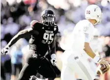  ?? Stacy Revere / Getty Images ?? After Texas A&M’s Julien Obioha, left, played his first three seasons at defensive end, he’s shifting inside to tackle with the Aggies well-stocked on the outside.