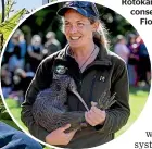  ?? ?? Rotokare Scenic Reserve conservati­on manager Fiona Gordon with a kiwi released at Pukeiti in the Kaitake Range earlier this year.
