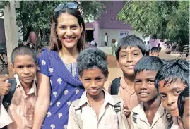  ??  ?? Poongkotha­i Chandrahas­an with students