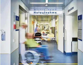  ?? UPIXA / ISTOCK ?? Notaufnahm­e in einem Krankenhau­s: Die meisten Kliniken in Deutschlan­d schreiben Verluste, manche müssen sogar Insolvenz anmelden.