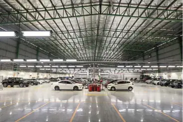  ?? ?? On track: a file photo of a Carro refurbishm­ent centre. The company’s earnings have improved significan­tly in the past year, through tech and larger vehicle volumes.