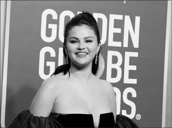  ?? JORDAN STRAUSS / INVISION / AP ?? Selena Gomez arrives Jan. 10 at the 80th annual Golden Globe Awards at the Beverly Hilton Hotel in Beverly Hills, Calif. When the singer-actor takes medication­s for her lupus, she gains water weight. She doesn’t stress about it, she says. “My medication­s are important and I believe they help me,” she said.