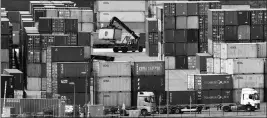  ?? ASSOCIATED PRESS ?? CONTAINERS ARE STORED FOR EXPORT at a harbor in Duisburg, Germany, on Monday.