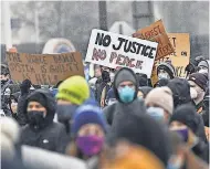  ?? DAVE SCHWARZ/ USA TODAY NETWORK ?? Protesters have taken to the streets in Brooklyn Center, Minn., daily since Daunte Wright was killed Sunday.