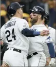  ?? CHRIS O’MEARA — THE ASSOCIATED PRESS ?? Tampa Bay Rays’ Kevin Kiermaier, right, celebrates his 3-run home run in the second inning against the Houston Astros with Avisail Garcia (24) during Game 3 of an American League Division Series, Monday, in St. Petersburg, Fla.