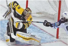  ?? STAFF PHOTO BY MATT STONE ?? STICK WITH HIM: Tuukka Rask and the Bruins will look to continue their strong play into the new year when they visit the New York Islanders tonight.