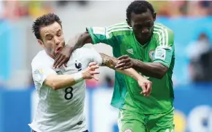  ??  ?? Super Eagles Juwon Oshaniwa (R) fights for the ball with Mathieu Valbuena of France at the 2014 World Cup in Brazil
