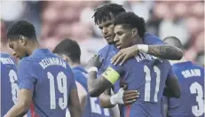  ??  ?? 0 Marcus Rashford celebrates after scoring his penalty