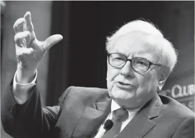  ?? KAMM / AFP / GETTY IMAGES ?? Some investors are asking how much longer Warren Buffett, 82, can remain at the helm of Berkshire Hathaway.