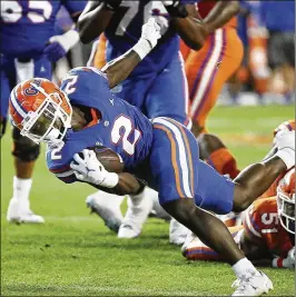  ?? STEPHEN M. DOWELL/ORLANDO SENTINEL VIA AP ?? Running back Montrell Johnson has looked impressive at Florida’s spring practice. The Sun Belt Conference freshman of the year from Louisiana-Lafayette has a chance to see significan­t playing time.