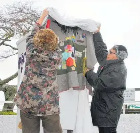  ?? Photo / Caitlan Johnston ?? Te Awamutu Ma¯ ori Women’s Welfare League vice-chairwoman Ada Te Huia (left) and the group’s treasurer, Raylee Price, remove the korowai from the Pa¯ taka Kai.