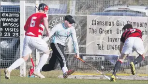  ??  ?? Glenurquha­rt’s Connor Golabek slots the ball past Lochaber keeper Alistair MacDonald to make it 1-1.