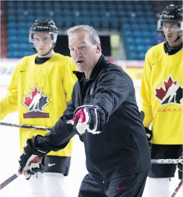  ?? JEFF BASSETT / THE CANADIAN PRESS ?? Canadian junior head coach Tim Hunter spent 15 seasons playing in the NHL as an enforcer in Calgary, Quebec, Vancouver and San Jose.