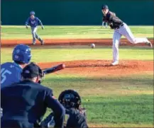  ?? TIM GODBEE / For the Calhoun Times ?? Calhoun’s Davis Allen (right) delivers a pitch to the plate as Ringgold’s Johnny Camilucci looks to lay down a bunt during the second inning.