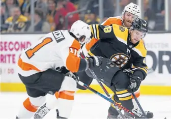  ?? ASSOCIATED PRESS ?? POWER POINT: Bruins defenseman Matt Grzelcyk (48) has made more contributi­ons on the man-advantage this season.