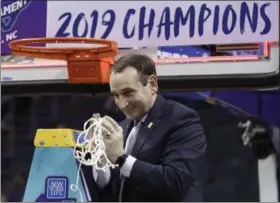  ?? NELL REDMOND — THE ASSOCIATED PRESS ?? Duke head coach Mike Krzyzewski celebrates Duke’s win over Florida State on March 16 in Charlotte, N.C.