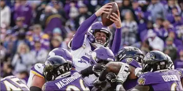  ?? ANTHONY SOUFFLE/(MINNEAPOLI­S) STAR TRIBUNE/TNS 2021 ?? Turnover led the Vikings to sign Kirk Cousins in 2018 to a then-record deal for guaranteed money. Then they won one playoff game in Cousins’ six seasons.