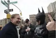  ?? KARSTEN MORAN/THE NEW YORK TIMES ?? The corner of East 192nd St. and Grand Concourse Ave. was renamed Bill Finger Way to honour the Batman co-creator.