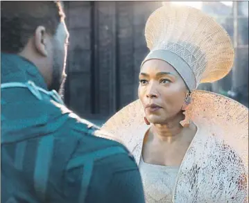  ?? Film Frame / Marvel Studios ?? ANGELA Bassett, shown with Chadwick Boseman, said she was humbled to play a queen in “Black Panther.”