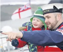  ??  ?? FAMILY Touching shot from a family day at Faslane on the Clyde