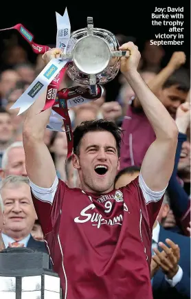  ??  ?? news@dailymail.ie Joy: David Burke with the trophy after victory in September