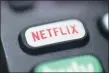  ?? JENNY KANE, FILE - THE AP ?? This Aug. 13 photo shows a logo for Netflix on a remote control in Portland, Ore. Netflix Inc. (NFLX) on Tuesday, Oct. 20 reported third-quarter net income of $790 million. The Los Gatos, California-based company said it had profit of $1.74 per share.