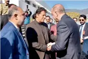  ?? — AP ?? Pakistan’s Prime Minister Imran Khan receives Turkey’s President Recep Tayyip Erdogan at the Parliament in Islamabad on Friday.