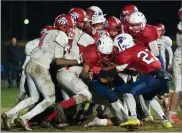  ?? RECORDER PHOTO BY CHIEKO HARA ?? A big push by Spartans, Strathmore High School's Joseph Garcia scores a touchdown on Nov. 24 during the CIF Central Section Football Division VI final against Rosamond High School at Spartan Stadium in Strathmore.