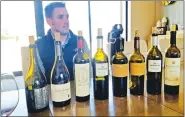  ?? Courtesy photos ?? Ryan Hughes, estate manage of the Spire Wine Collection, and the wines poured at the tasting.