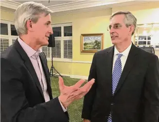  ?? Dan Haar / Hearst Connecticu­t Media ?? West Hartford Republican Dr. Larry Lazor, left, hosted Georgia Secretary of State Brad Raffensper­ger at the Hartford Golf Club on Tuesday for a talk on elections.