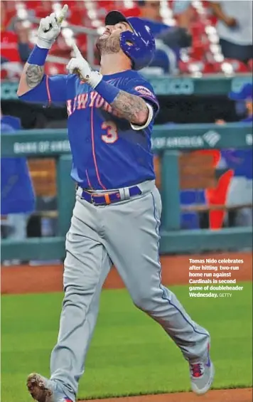  ?? GETTY ?? Tomas Nido celebrates after hitting two-run home run against Cardinals in second game of doublehead­er Wednesday.