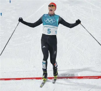  ?? FOTO: DPA ?? Urschrei auf der Linie: Eric Frenzel ist am Ziel seiner Träume, seinem zweiten Olympiasie­g.
