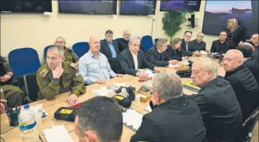  ?? AFP ?? Israel's Prime Minister Benjamin Netanyahu (centre) during a war cabinet meeting at the Kirya in Tel Aviv, on Sunday.