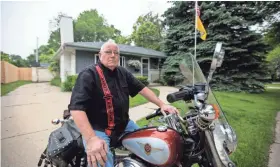  ?? TYGER WILLIAMS / MILWAUKEE JOURNAL SENTINEL ?? Ted Palmatier owns a 2000 Harley-Davidson Fat Boy motorcycle, which he has had for about 11 years. He is in favor of President Donald Trump in his battle with Harley’s decision to move some production overseas. “That’s going to kill the brand,” said Palmatier. “I don’t think it’s good for business and this corporatio­n.”