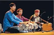  ??  ?? Jamming: Basant Madhur, Prashant Kumar and Professor S.D. Madhur share their musical talents with the massive crowd.