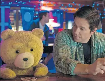  ??  ?? TED ( VOICED BY
Seth MacFarlane) and John ( Mark Wahlberg) catch up over a few beers in “Ted 2.”