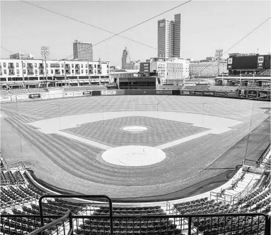  ?? MIKE MOORE/AP ?? An empty Parkview Field minor league baseball stadium April 8 in Fort Wayne, Ind. Minor league umpires are out of jobs so far and maybe all year due to coronaviru­s shutdown.