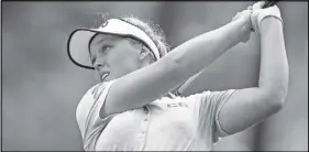  ?? AP PHOTO ?? Brooke Henderson watches a shot during play Thursday at the U.S. Women’s Open.