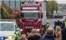  ??  ?? The lorry is driven away from the scene. Photograph: Vickie Flores/EPA