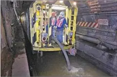  ?? AP PHOTOS ?? Gov. Cuomo will tour L train tunnel Thursday (above, being drained after Hurricane Sandy in 2012) to check whether fix needs to take 15 months.