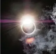  ?? BUSINESS WIRE ?? This year’s eclipse is expected to be the most-watched celestial event in our lifetime. During the eclipse, the sky will darken, making warm colors appear less vibrant and shades of green and blue seem brighter.