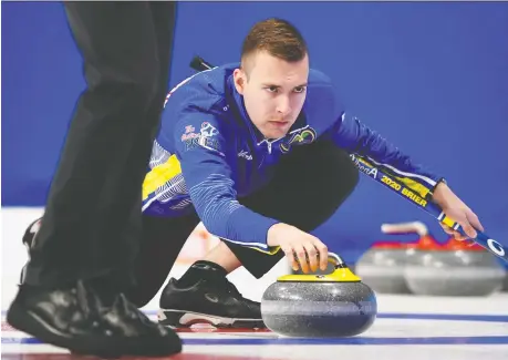  ??  ?? Team Alberta skip Brendan Bottcher delivers the rock against Nunavut at the Brier in Kingston, Ont., on Sunday. Team Bottcher was the only rink without a loss at the Brier after beating Nova Scotia 6-2 on Tuesday afternoon to run its record to 5-0. SEAN KILPATRICK/THE CANADIAN PRESS