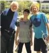  ?? COURTESY OF MICHAEL MILLER ?? John Williams, left, poses for a photo with trumpeter Bryce Hayashi, center, and his teacher, Michael Miller.